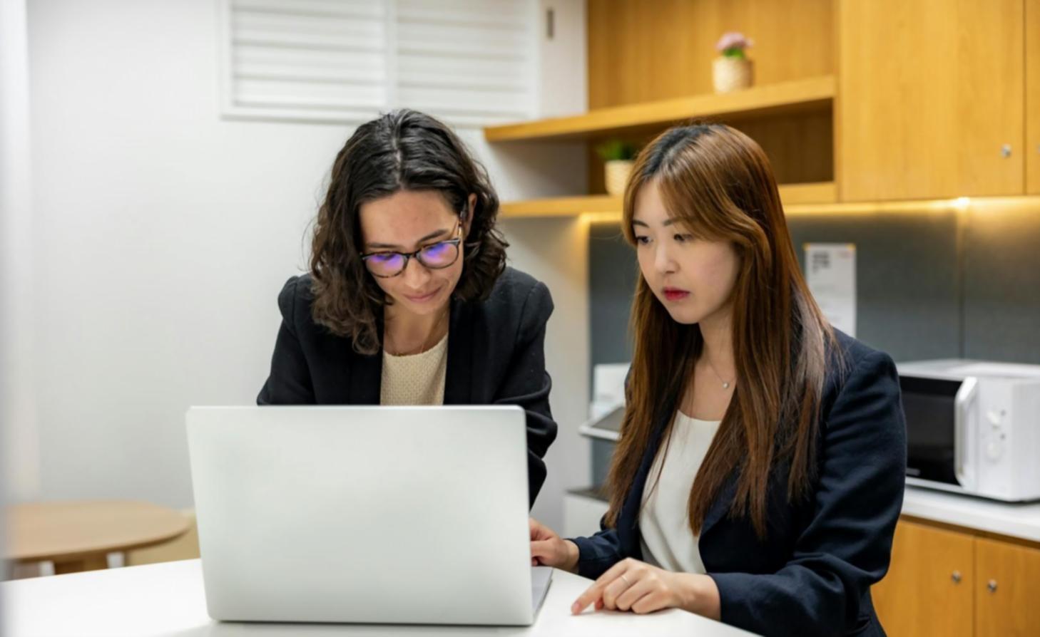 Business professionals analyzing financial data and strategic planning documents